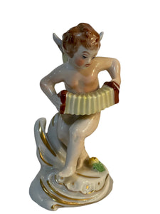 Ceramica Capodimonte, angioletto musico, XX secolo